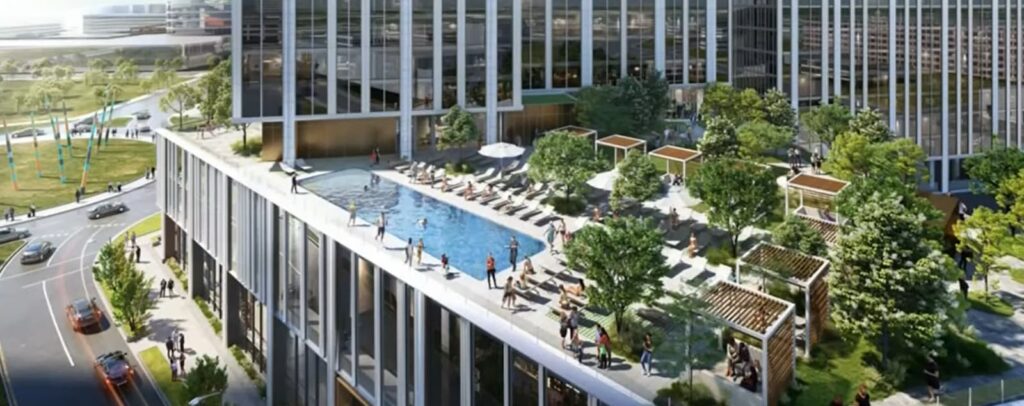 Rooftop pool of the Ritz-Carlton with people enjoying the sun