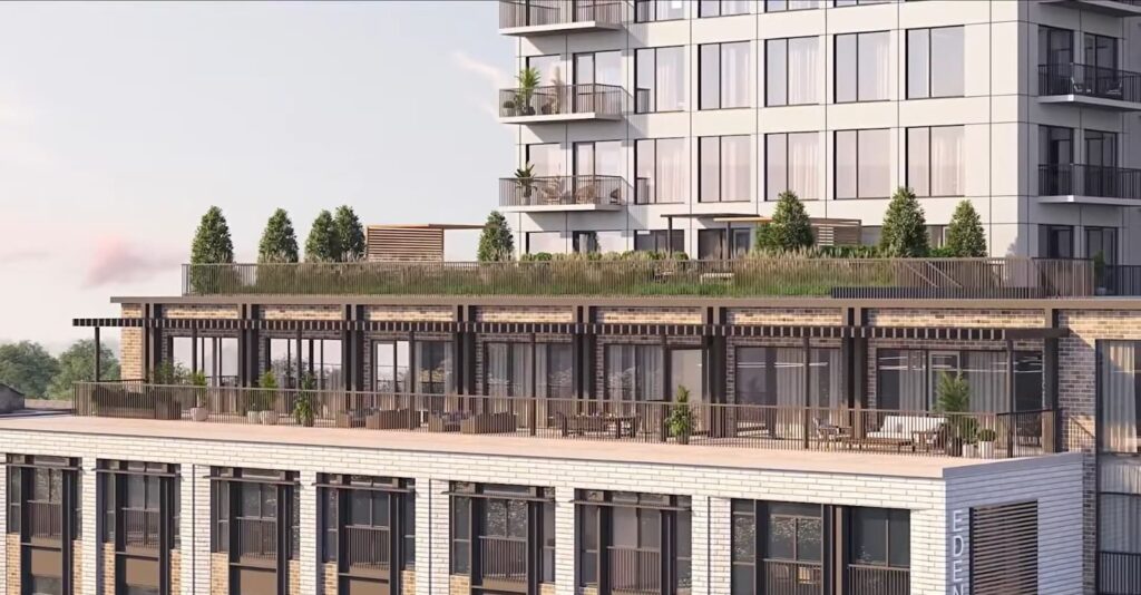 Close-up of a building's rooftop garden and terrace with wooden details