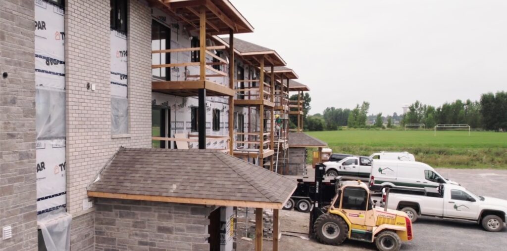 The process of building a house, construction equipment nearby